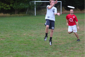 JT Schwindt (left) jumping for a catch during a match.